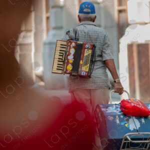 Man carrying an accordion