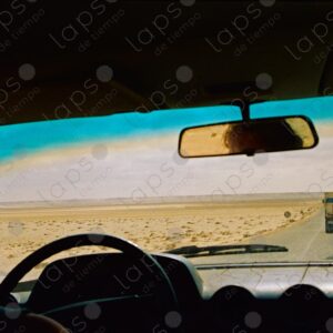 Desert Road View from Windshield with Woman Driver