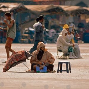 Local Woman on the Ground in Jemaa el-Fna, Marrakech