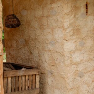 Adobe wall with rustic wooden structure 1