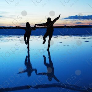 Adult and Child Reflection in Salar de Uyuni