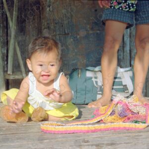 Baby on wooden floor