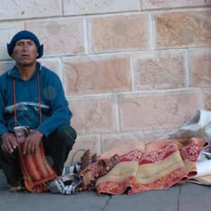 Bolivian Man Ambulant Seller of Textiles 4