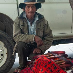 Bolivian Man Ambulant Seller of Textiles and Aguayos