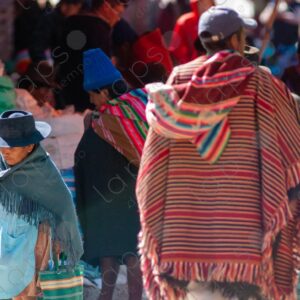 Bolivian people and indigenous individuals walking through the textile market 5