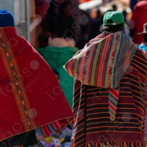 Bolivian people and indigenous individuals walking through the textile market 6
