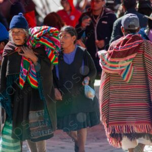 Bolivian people and indigenous individuals walking through the textile market 8