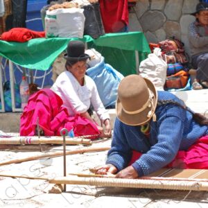 Bolivian women with their looms