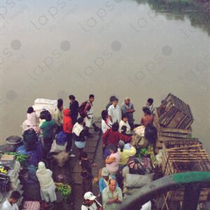 Bow of a ship with passengers and the Amazon River