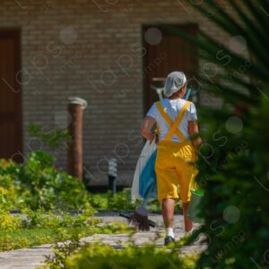 Cleaning worker walking in a resort
