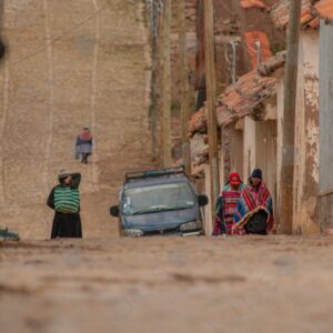 Cobblestone Street Slope Elderly Bolivian Woman Climbing in the Distance 2