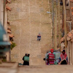 Cobblestone Street Slope Elderly Bolivian Woman Climbing in the Distance 3