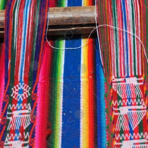 Colorful drawing woven detail on loom 2