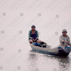 Couple in a canoe on the river 2