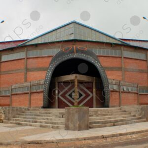 Facade of a Shed with Entrance Featuring Giant Tarabuco Helmet