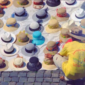 Hat sales on the cobblestone streets, Rome, Italy