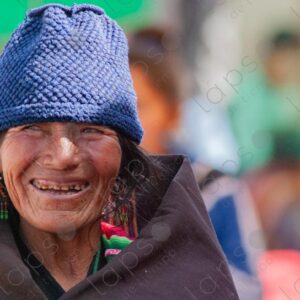 Indigenous woman with worn teeth