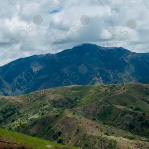 Landscape of Green Hills and Clouds