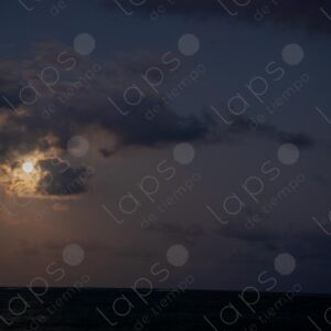 Landscape with the moon behind the clouds and the sea 1
