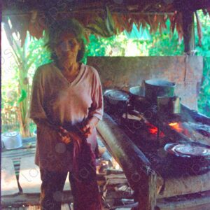 Local grandmother from Sinchicuy and her rustic kitchen