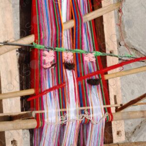 Loom with colored wool