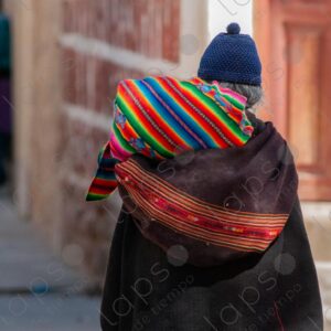 Indigenous woman carrying aguayos
