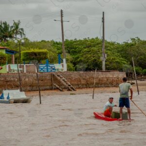 Men in a small raft in the middle of the river 1