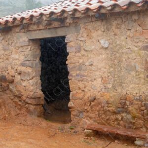 Mud and Stone House in Drizzle