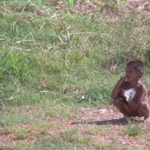 Naked boy in the grass