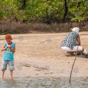 Redhaired boy by the riverside 2