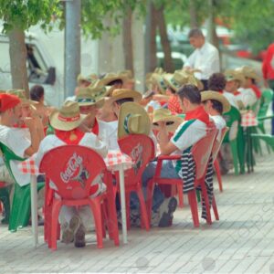 San Fermín, people at tables outside restaurants