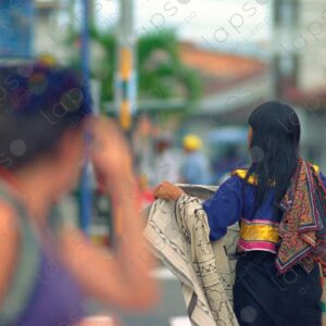 Shipibo woman with her back turned