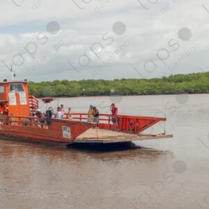 Small ferry arriving at the port 2