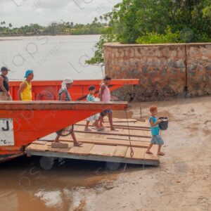 Small ferry arriving at the port passengers disembarking 1