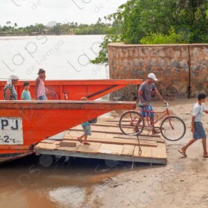 Small ferry arriving at the port passengers disembarking 2
