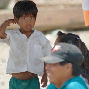 The child looks at the camera