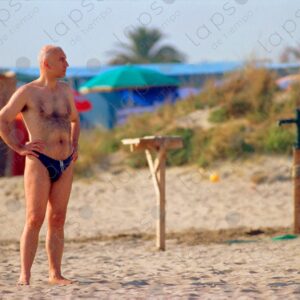 Torvaianica man in swimsuit, summer, Italy