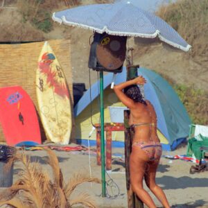 Torvaianica shower on the beach, woman, Italy