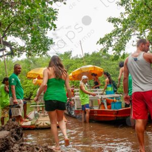Tourists boarding a small boat on the river 1