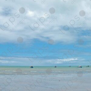 Turquoise sea several artisanal fishing boats floating 1