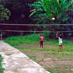 Two local girls play volleyball