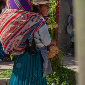 Woman Walking in Profile with Aguayo