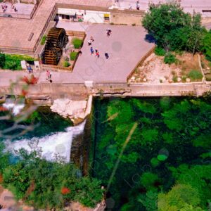 Aerial view of the Vaucluse River, a mill and some houses 2