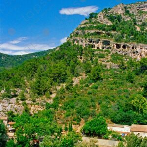 Prehistoric cave dwellings clinging to mountain cliffs, Vaucluse, Luberon, Provence 2