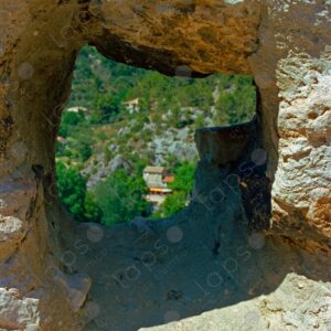 View through the hole in the stone wall Vaucluse 2