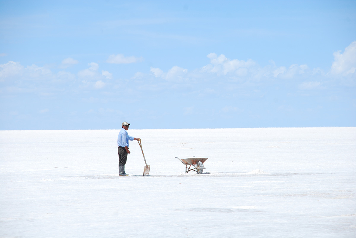 Alone Man with Shovel and Wheelbarrow in Salar de Uyuni 1