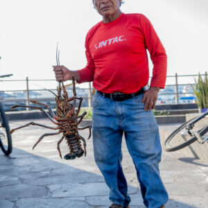 man poses with lobster 1