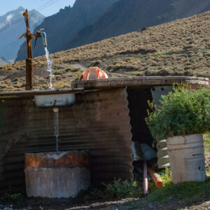 washing dishes at a spring